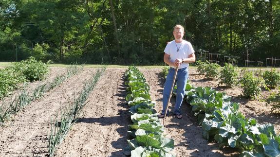 Brother Austin gardening.